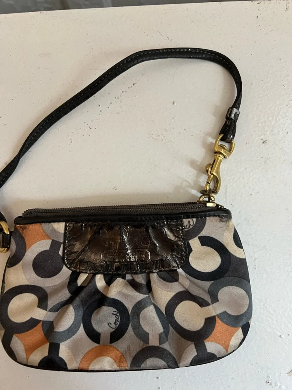 Coach Small Signature Circle Print Wristlet in Black, Tan and Gray